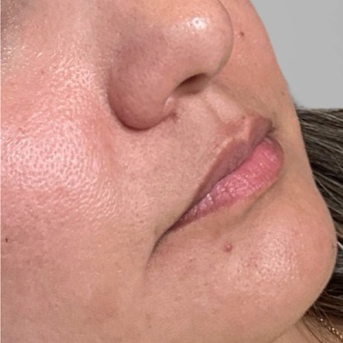 a close up of a man with his mouth open